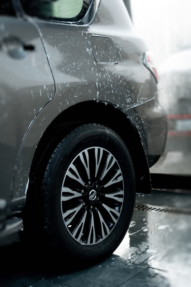 Alloy wheel being cleaned in close-up